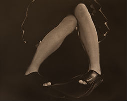 girlie legs with a party dress and flippers